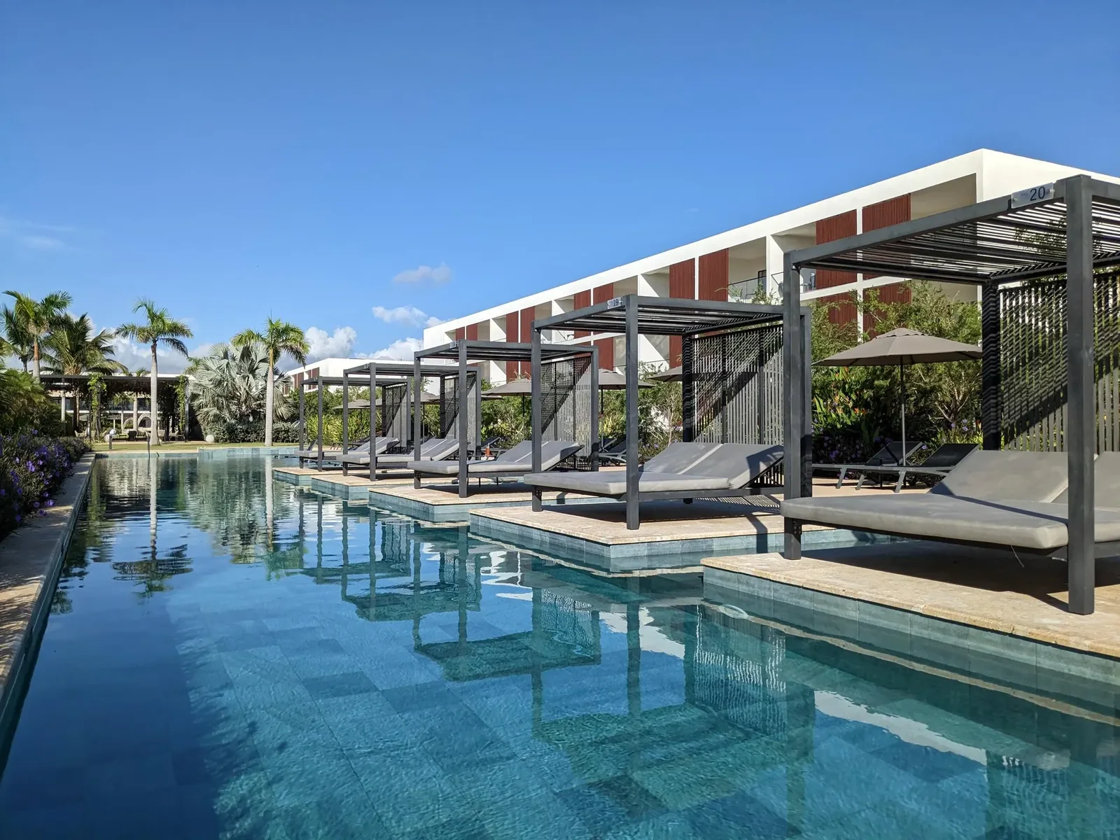 Poolside cabanas at Live Aqua Beach Resort Punta Cana